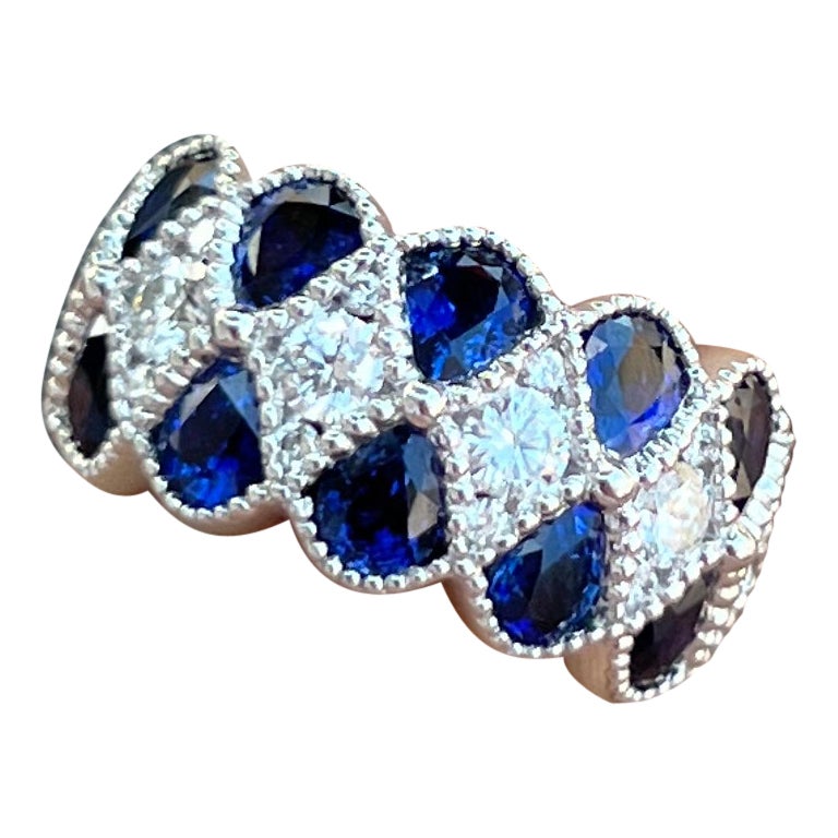 Pear Shape Sapphires and Diamonds Band Ring For Sale