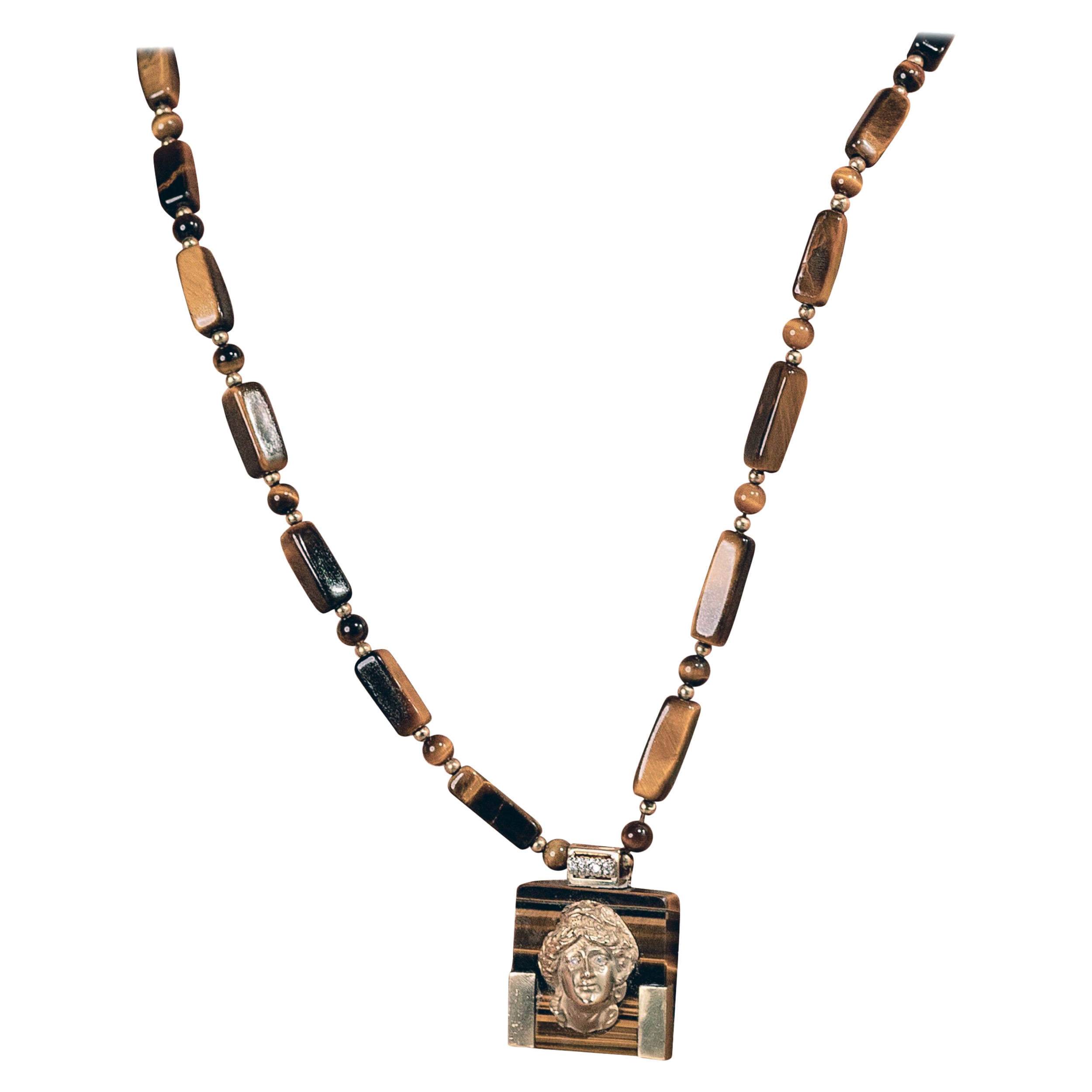 Tiger Eye Necklace With Articulated 14ct Gold Portrait Pendant For Sale