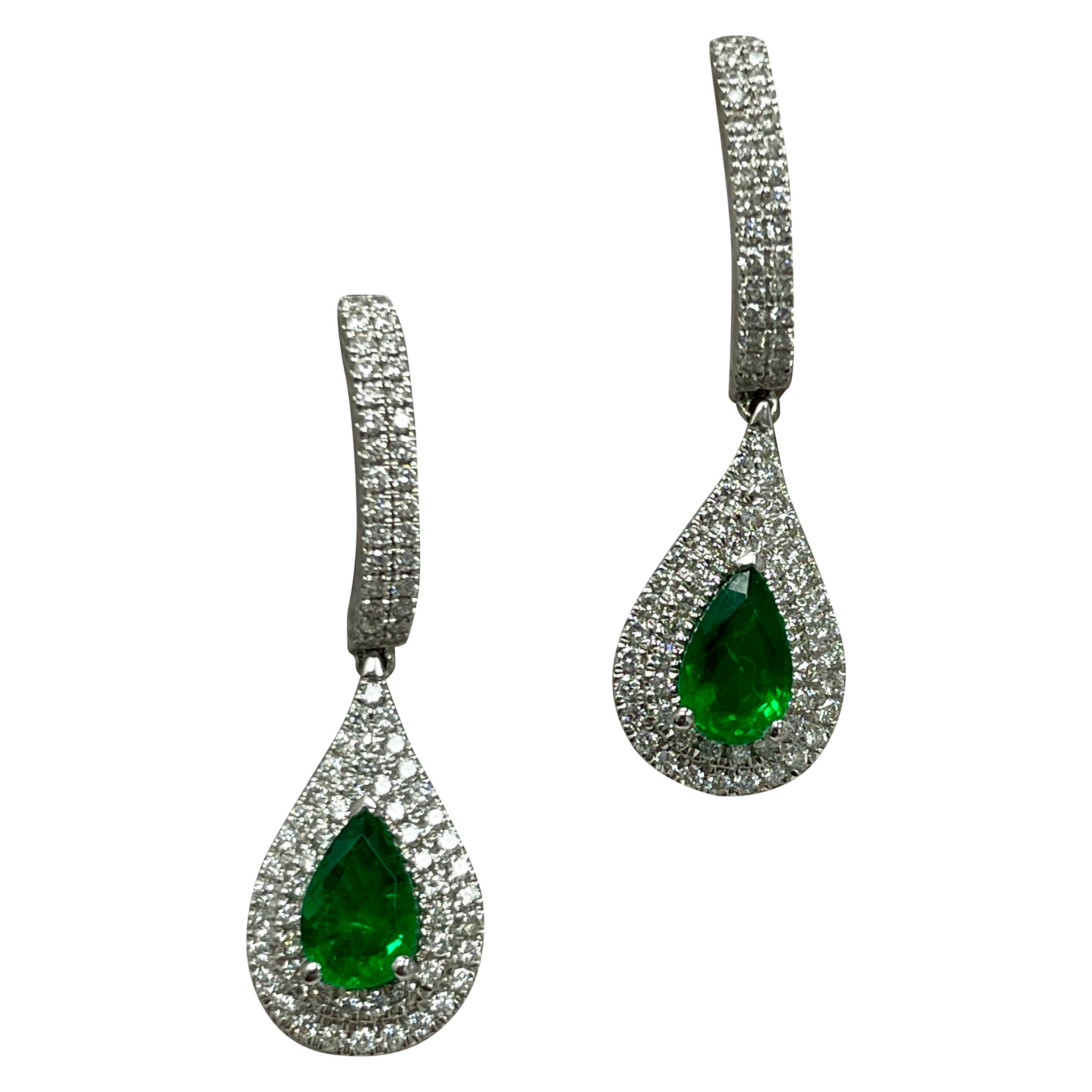 1.29 Carat Emerald, Diamond & White Gold Earrings For Sale