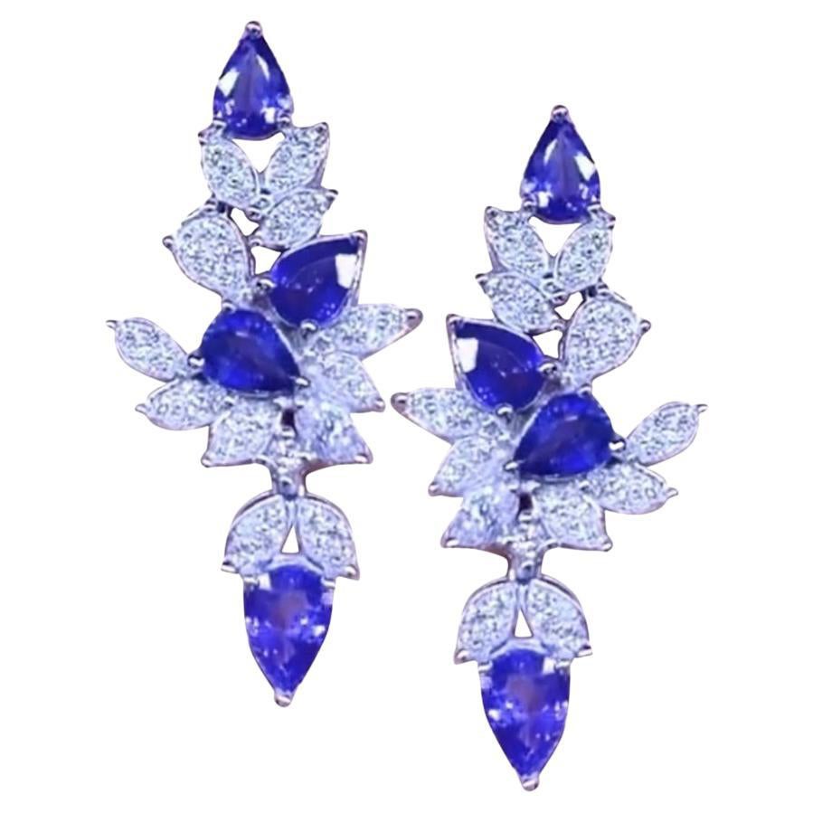 Prix de réserve. 9,10 carats de saphirs bleus de Ceylan et diamants en vente