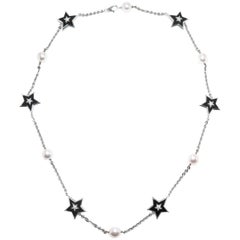 Chanel - Collana di stelle in oro con perle d'onice e diamanti