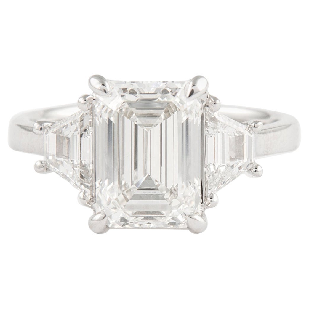 Alexander GIA Certified 3.01ct I VVS1 Emerald Cut Diamond Three-Stone Ring 18k For Sale