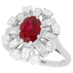 Thai Oval Cut Ruby and 1.60 Carat Diamond Ring in Platinum