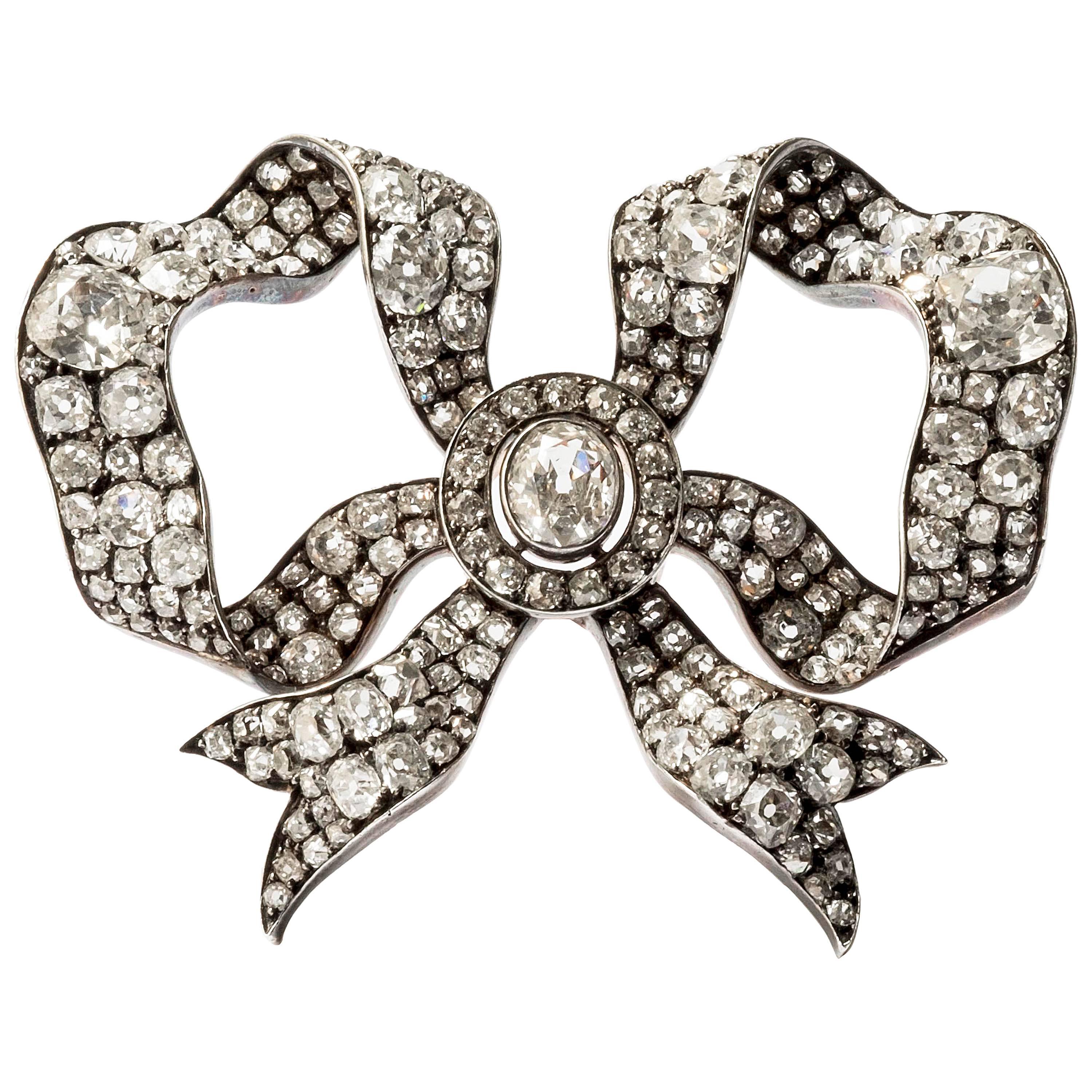 1880s Old Cut Diamonds Silver Sparkling Gold "Bow" Brooch  For Sale