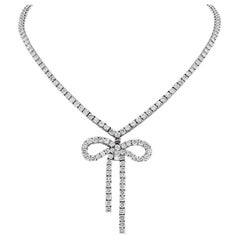 Collier tennis en or blanc 18K avec nœud en diamants de 21,50cttw