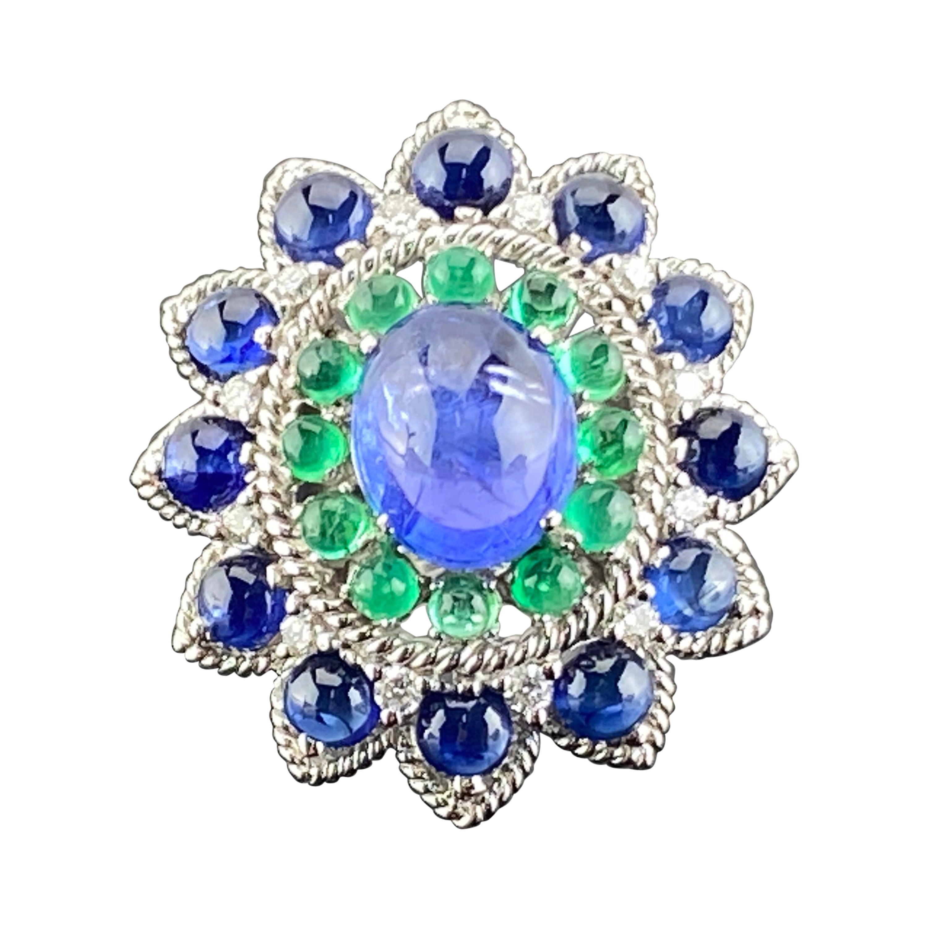 Bague cocktail vintage en or avec tanzanite, émeraude et saphir cabochon de 4 carats