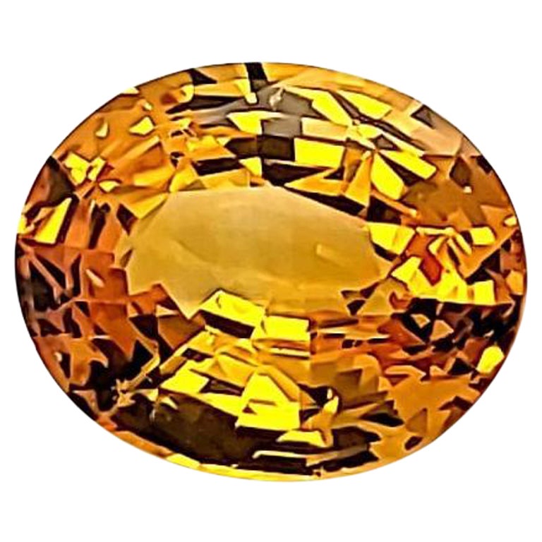 6.04 Carats Intense Yellow Natural Sapphire Oval Cut GIA Certified