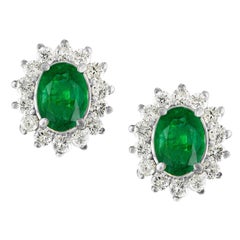 4 Carat Oval Shape Emerald and Diamond Post Back Earrings 14 Karat White Gold