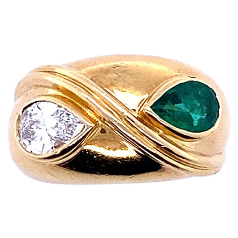 Vintage Fred Paris Diamond Emerald 18 Karat Yellow Gold Bypass Engagement Ring For Sale