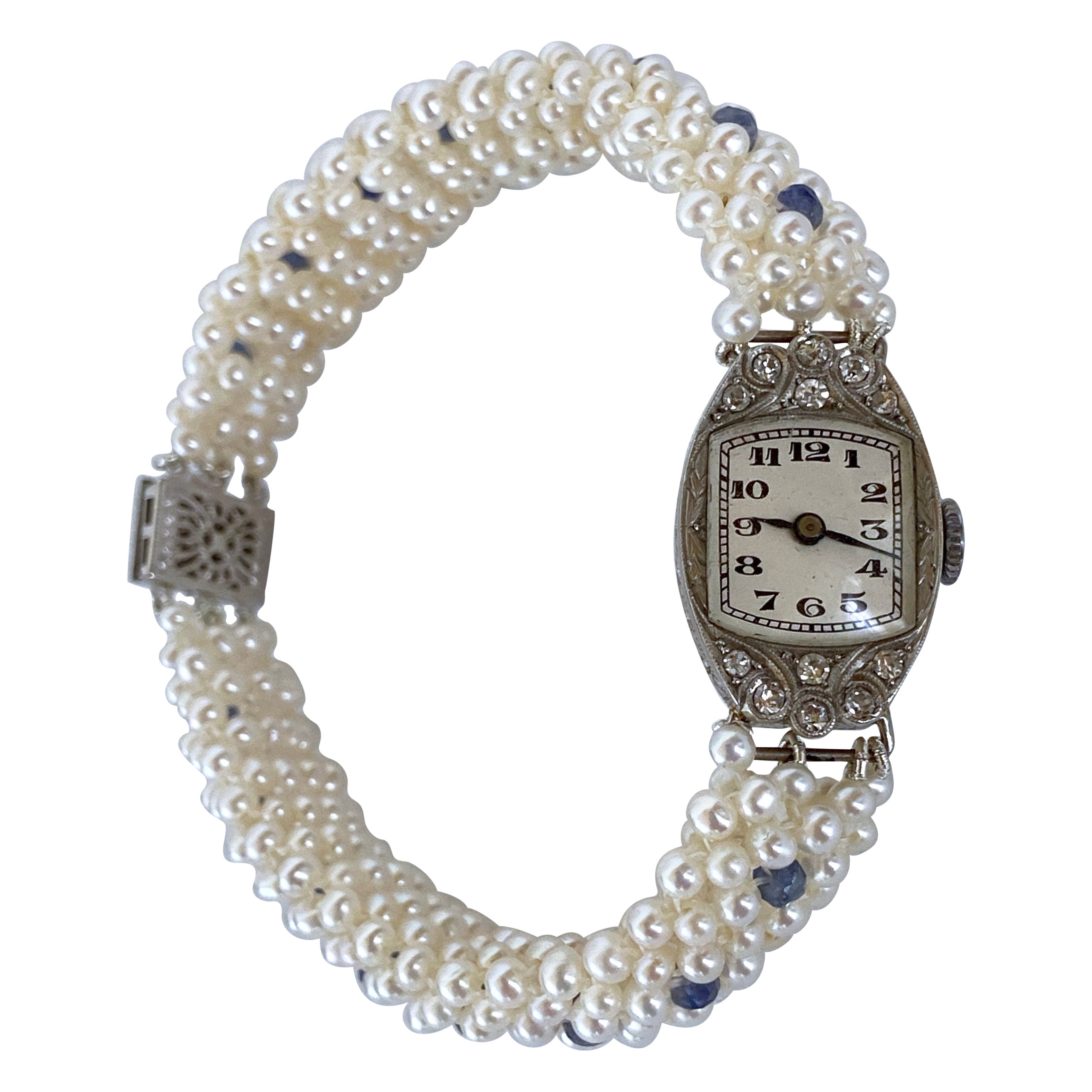 Marina J. Vintage Platin- und Diamantuhr mit blauem Saphir und Perlen