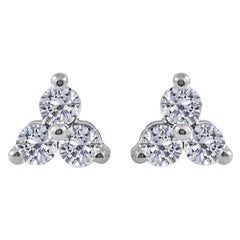 Clous d'oreilles à 3 pierres en or blanc 14 carats avec diamants 0,51 carat