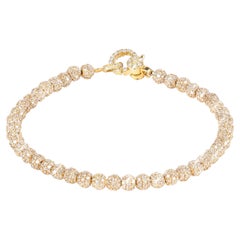 Bracciale tennis con diamanti incrostati in oro giallo 18k