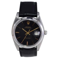 Rolex Steel Oyster Date with Elegant Factory Black Dial and Gilt Numbers 1970's