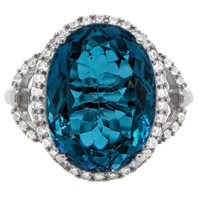 Oval Cut 12 Carat London Blue Topaz Ring with White Topaz Halo Silver ...