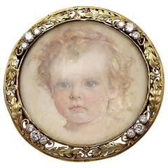 Edward Oakes Art Nouveau Portrait of a Child Brooch in Gold