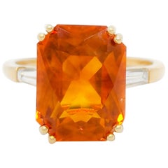 Used GIA Orange Sapphire and White Diamond Three Stone Ring in 18k