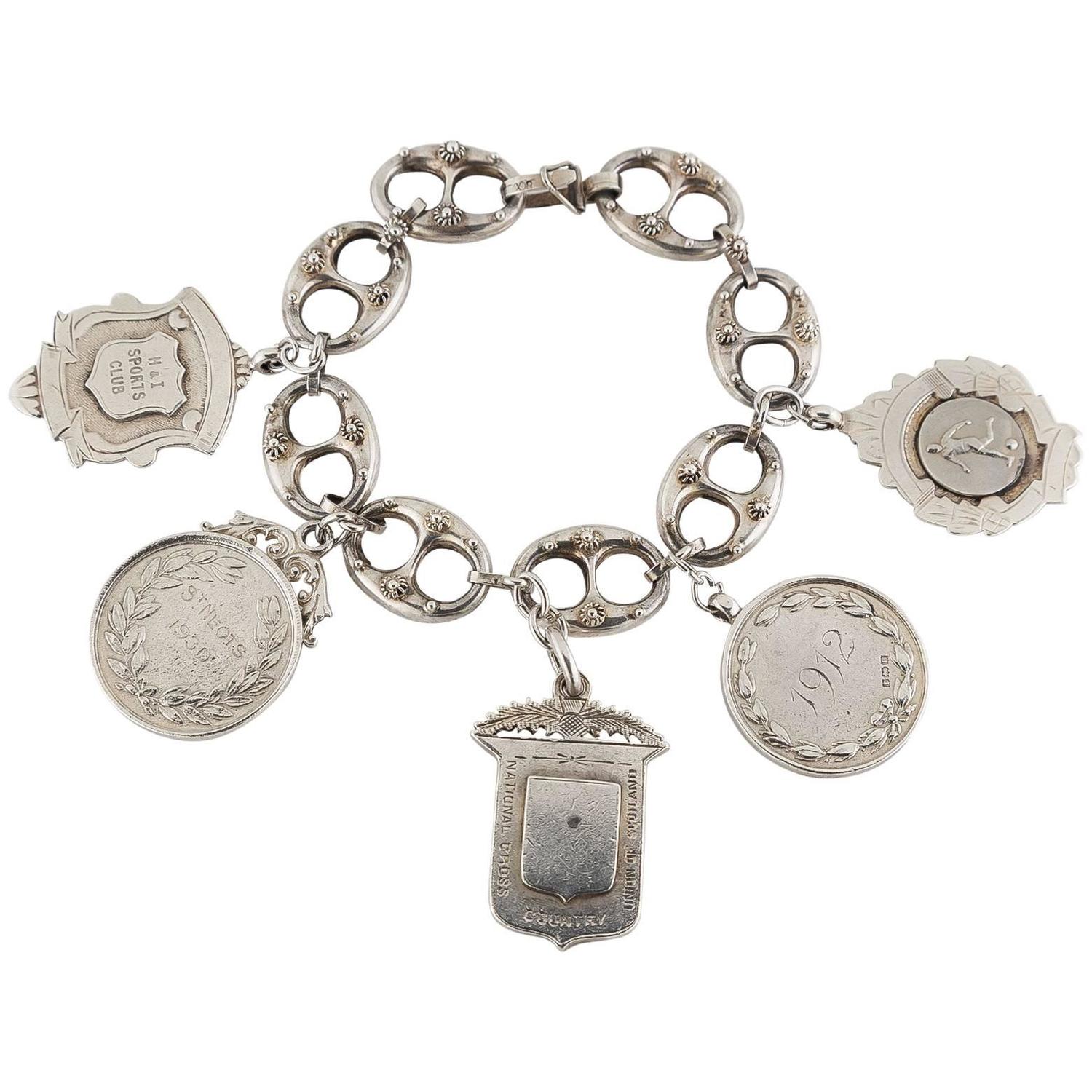 Victorian Sterling Silver Charm Bracelet For Sale at 1stdibs