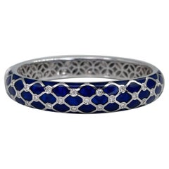 Modern 18 Karat Gold Diamond Blue Glass Hinged Bangle Bracelet