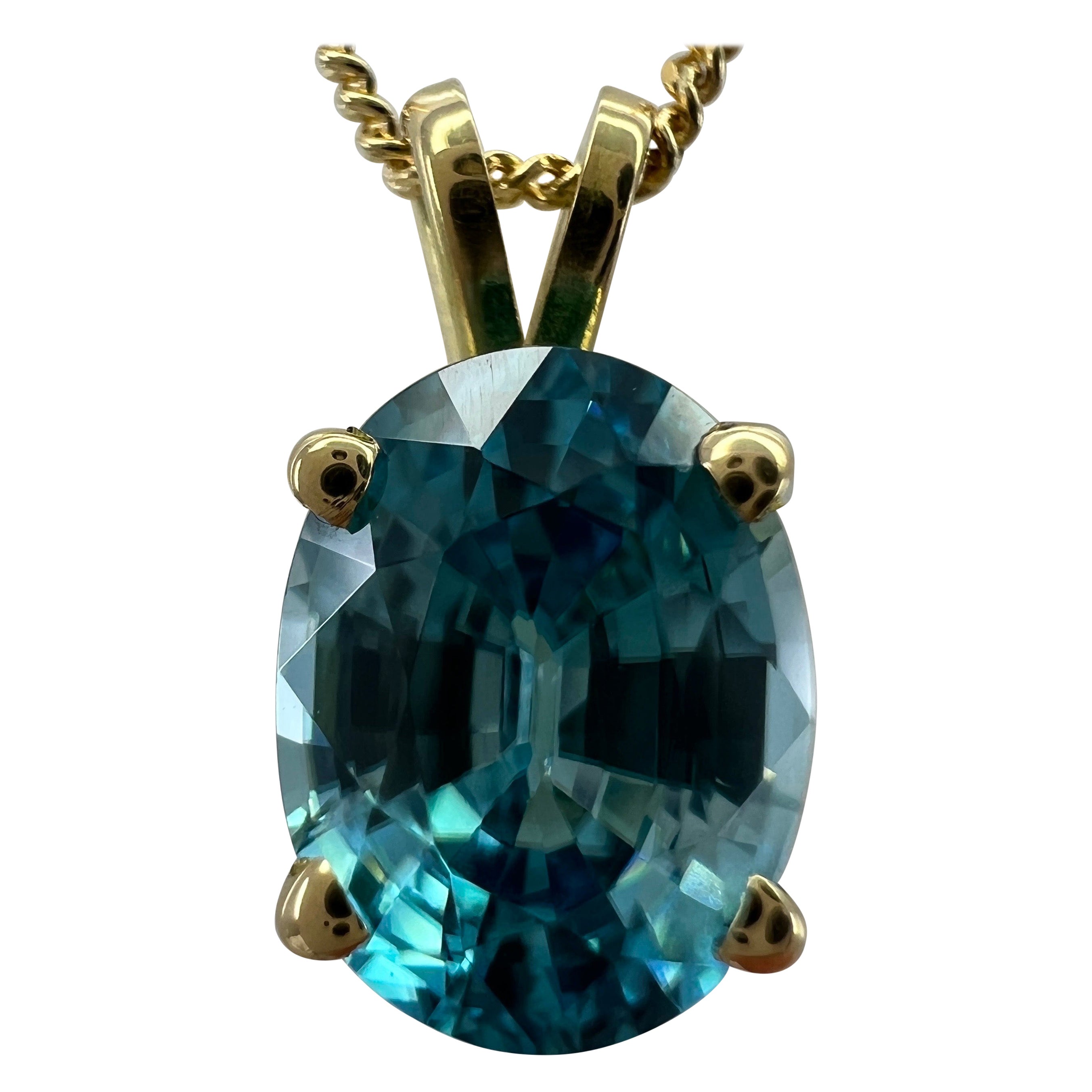 Vivid Neon Blue Zircon 3.10 Carat Oval Cut 18k Yellow Gold Pendant Necklace For Sale
