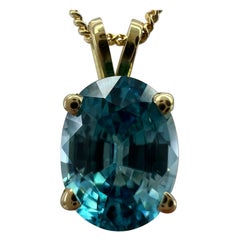 Vivid Neon Blue Zircon 3.10 Carat Oval Cut 18k Yellow Gold Pendant Necklace