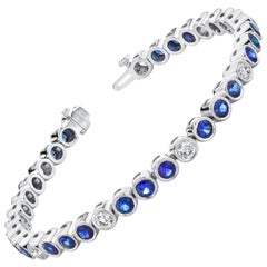 Blue Sapphire and Diamond Tennis Bracelet, White Gold Bezel, 6.42 Carats Total