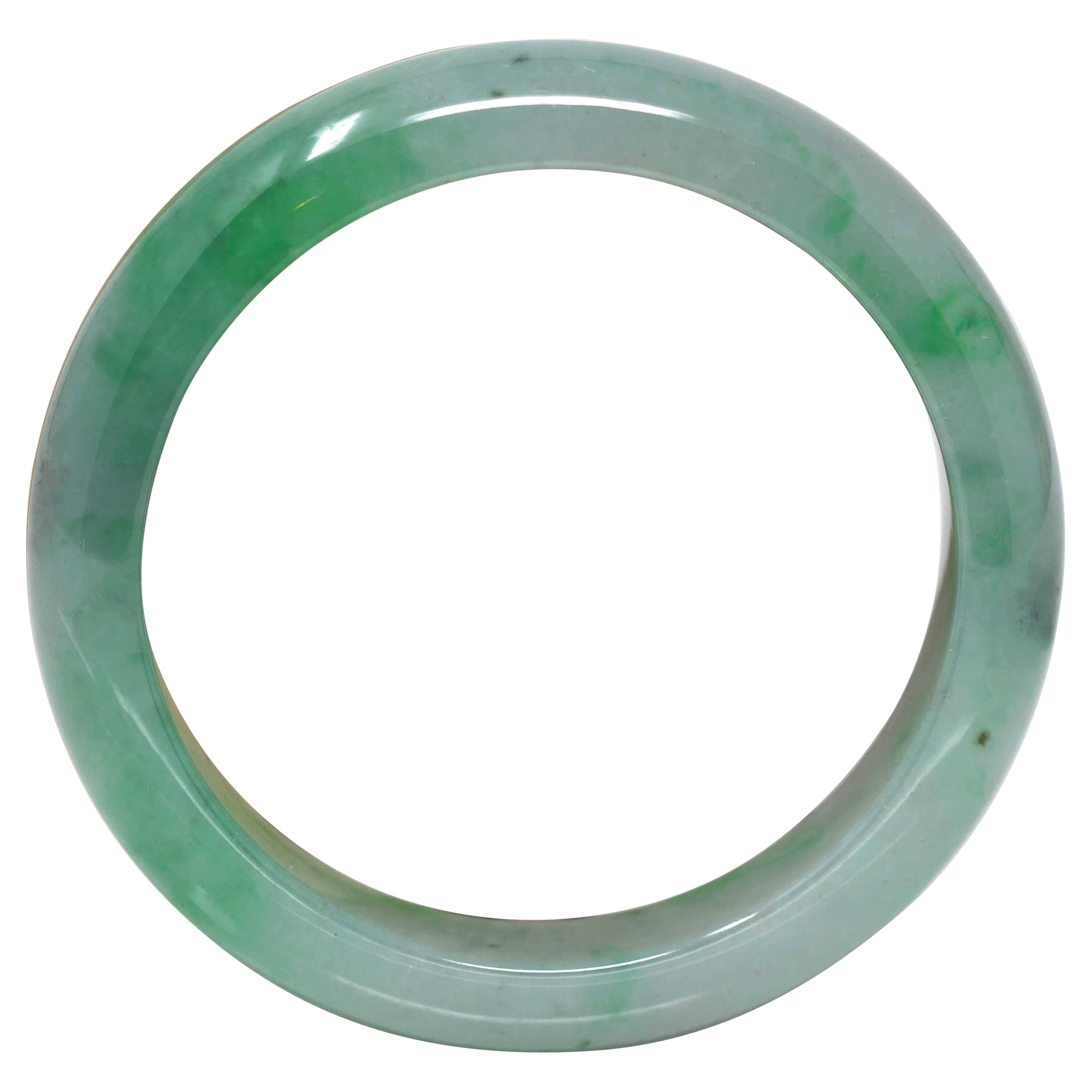 * DETAILS--- Genuine Burmese Jadeite Jade Bangle Bracelet. This bangle is made with high-quality genuine Burmese Jadeite jade, The jade texture is so smooth with lots of vibrant green colors inside. It looks perfect with green parts and transparent
