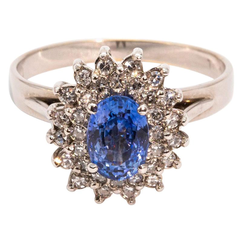 1.30 Carat Bright Blue Sapphire and Diamond 18 Carat White Gold Cluster Ring
