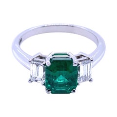1.65 Carat Zambian Emerald and Diamond Three Stone Platinum Engagement Ring