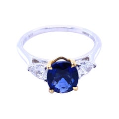 1.68 Carat Sapphire and Diamond Three Stone Platinum Engagement Ring