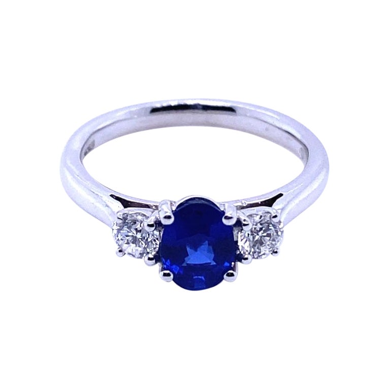 0.89 Carat Sapphire and Diamond Three Stone 18 Karat White Gold Engagement Ring For Sale