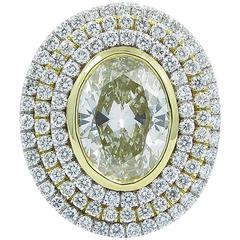 3.12 Carat Fancy Color Oval Diamond Gold Triple Halo Ring 