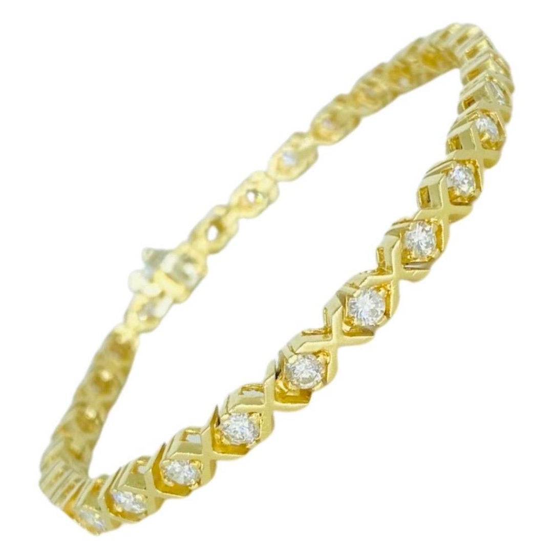 Bracelet tennis vintage en 14 carats avec diamants d'un poids total de 4,20 carats en vente