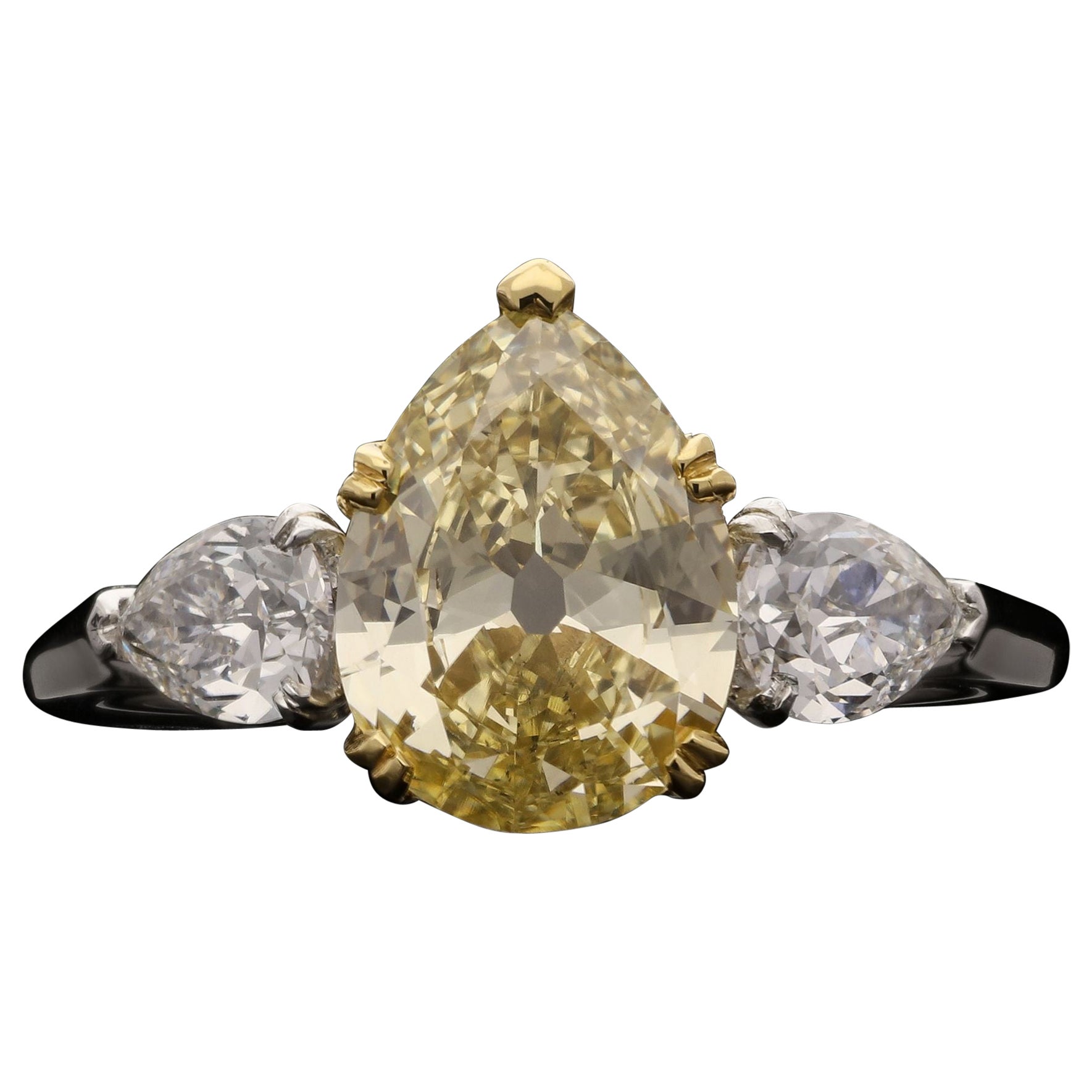 Hancocks 1.49ct Fancy Yellow Old Cut Pear Shape Diamond Ring With Pear Shoulders For Sale