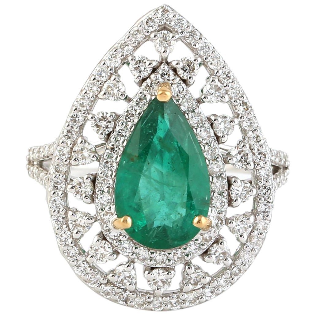 Pear Drop Shaped Green Emerald Ring with Halo Diamonds Made in 18k White Gold For Sale