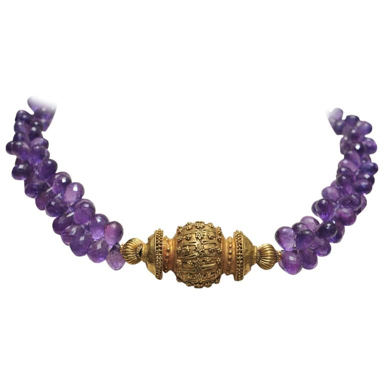 Faceted Amethyst Briolettes with 22 Karat Gold Centerpiece Bead at 1stDibs
