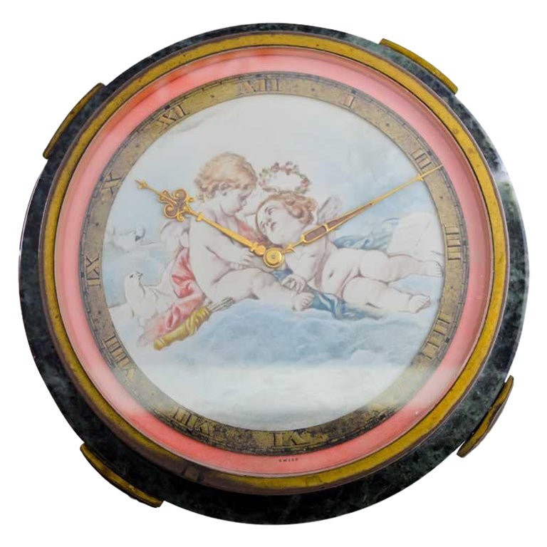 Art déco Gubelin Stone and Metal Art Deco Table Clock with Cherubic Hand Made Dial 1930's en vente