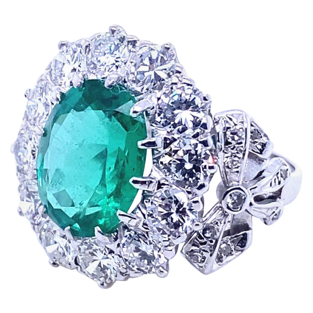 4.15 Carat Zambian Emerald and Diamond Cluster 18 Kt White Gold Engagement Ring For Sale