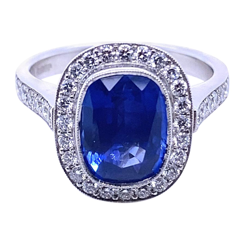 3.12 Carat Sapphire and Diamond Platinum Cluster Engagement Ring For Sale