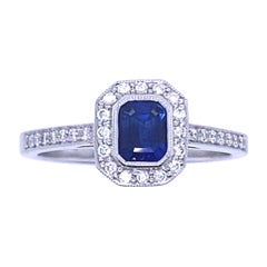 0.61 Carat Sapphire and Diamond Cluster Platinum Engagement Ring