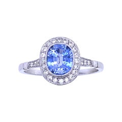 0.89 Carat Sapphire and Diamond Cluster Platinum Engagement Ring