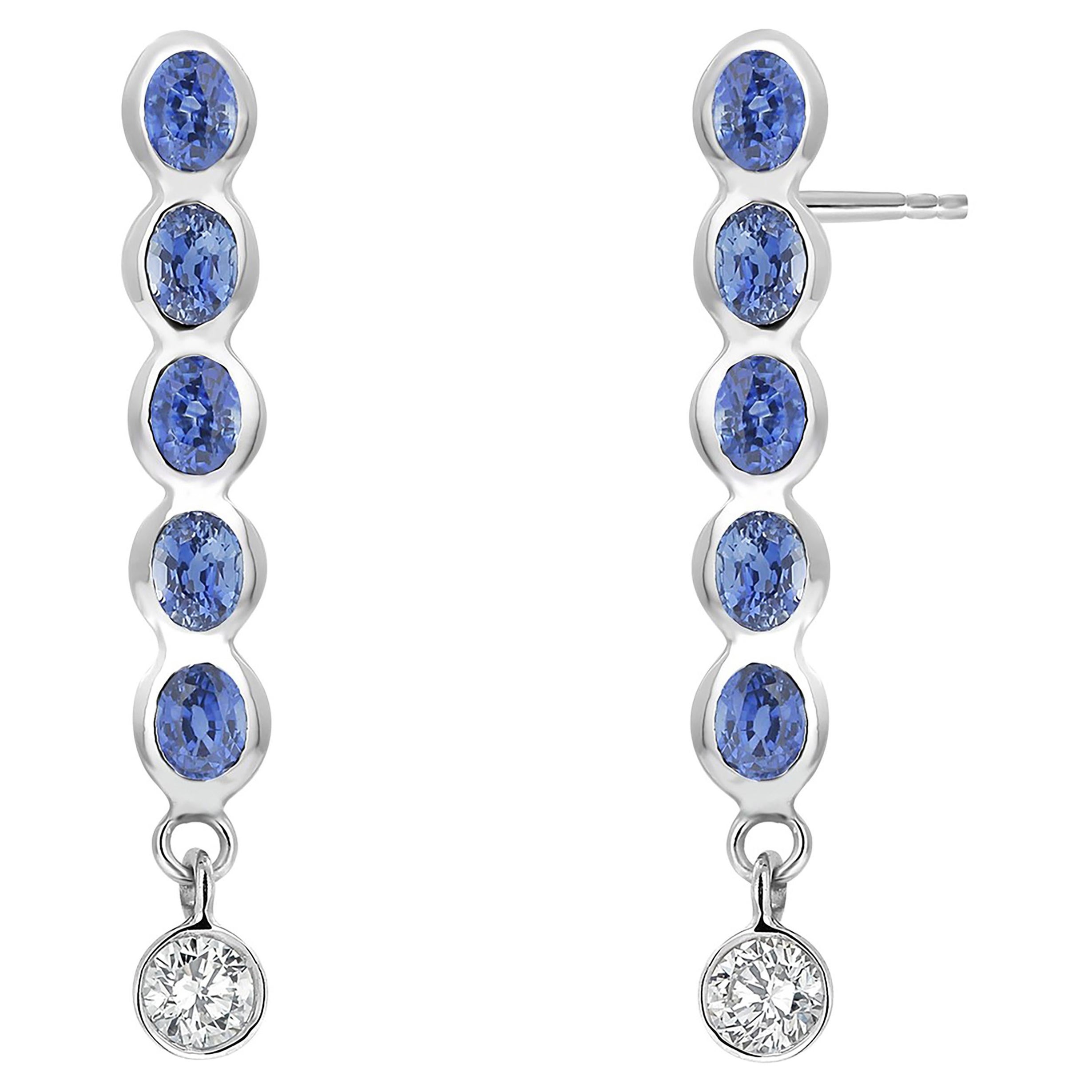 Ten Oval Shaped Sapphire Drop and Two Diamonds Linear White Gold Drop Earrings