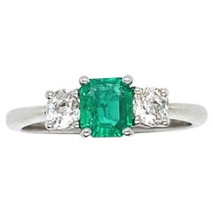 0.43 Carat Columbian Emerald and Diamond Three Stone Platinum Engagement Ring