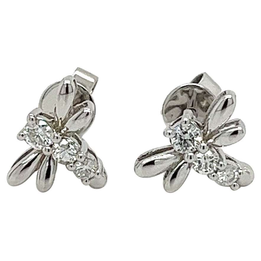 Clous d'oreilles en forme de libellule en or blanc 14 carats et diamants 