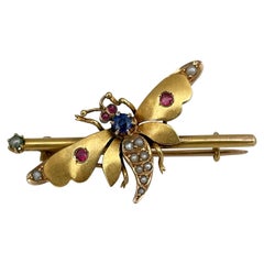 Victorian 18 Karat Yellow Gold Seed Pearl Blue Red Paste Butterfly Bar Brooch