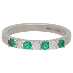 Contemporary Emerald and Diamond Half Eternity Band Ring Set in Platinum