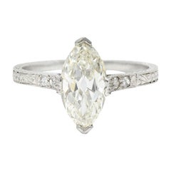 Art Deco 1.46 Carats Marquise Diamond Platinum Engraved Engagement Ring