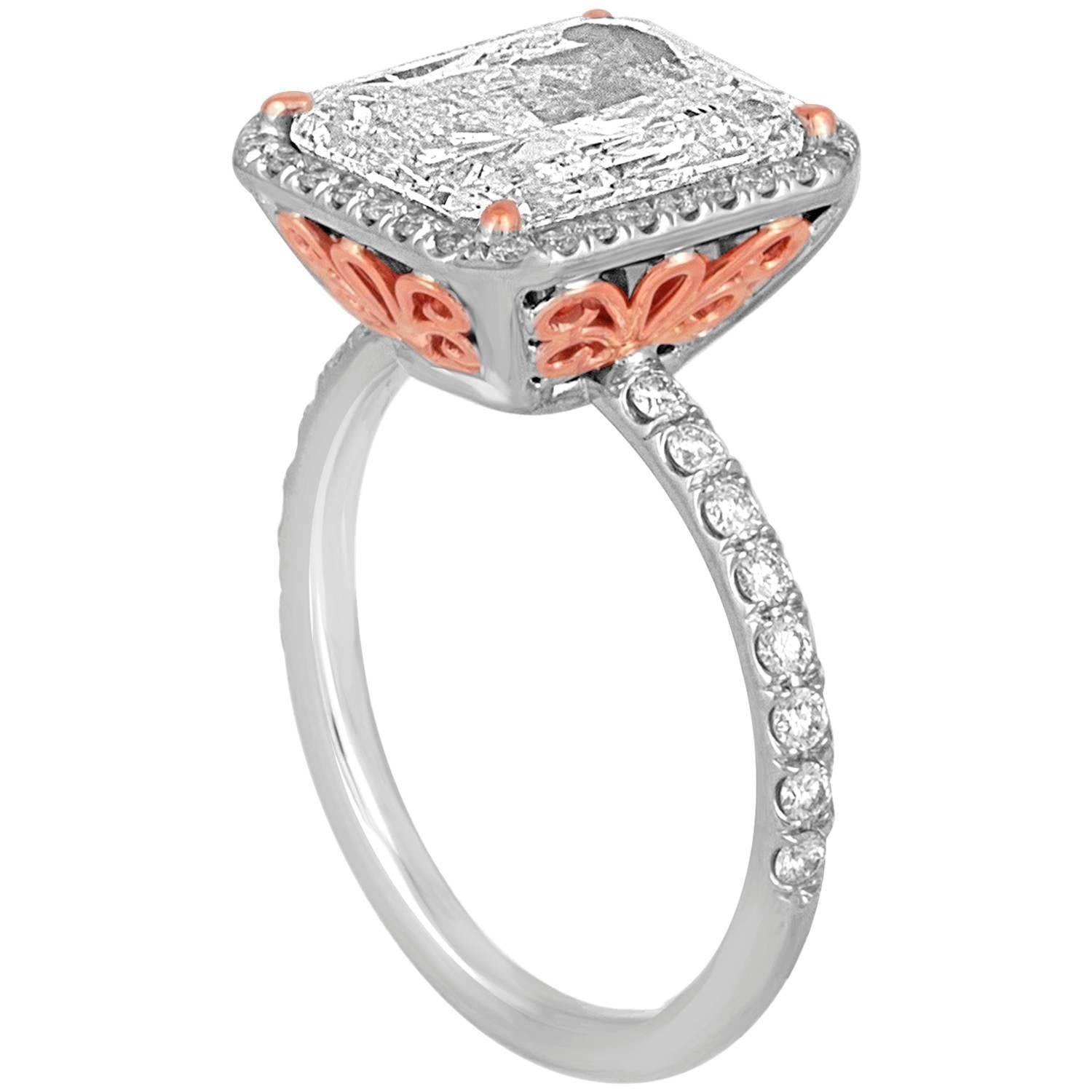 5.04 Carat Diamond Halo Two-Color Gold Ring For Sale