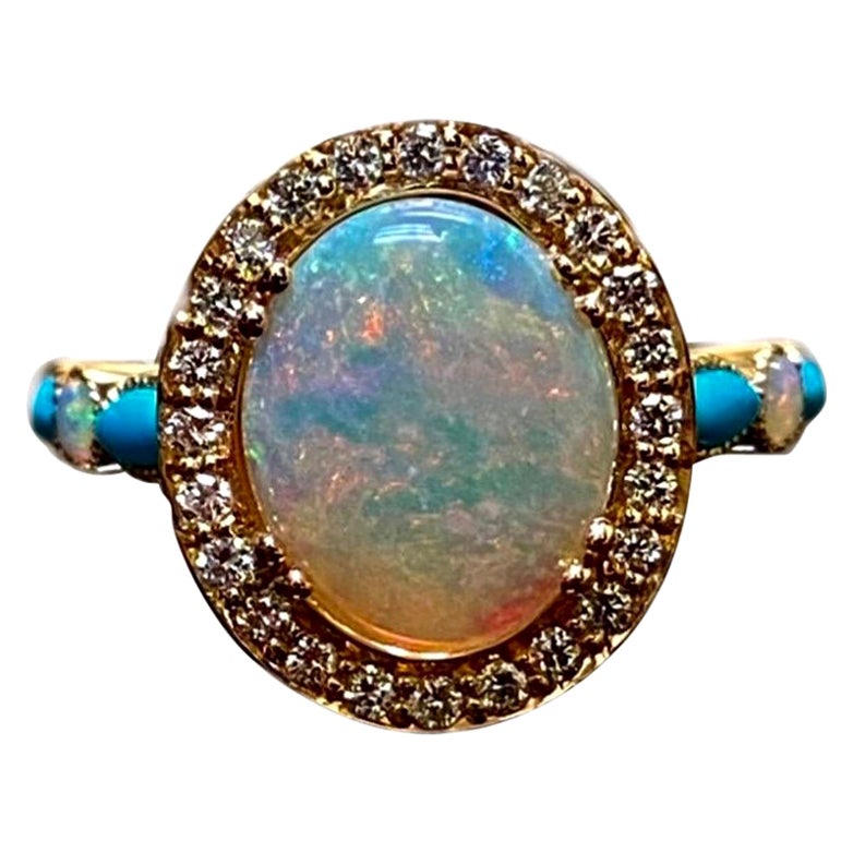 Bague de fiançailles en or rose 18 carats avec halo de diamants, turquoise et opale d'Australie
