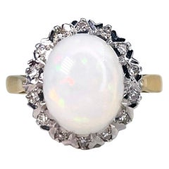 Vintage 18 Karat Gold Cabochon White Opal 0.10 Carat Diamond Cluster Ring