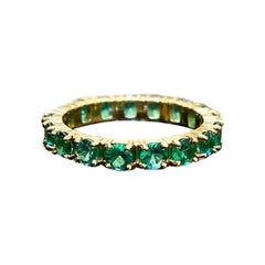 18K Yellow Gold Shared Prong Round Emerald Eternity Engagement Band